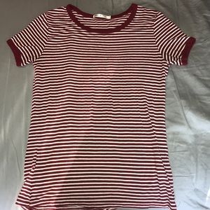 White and red striped t shirt.